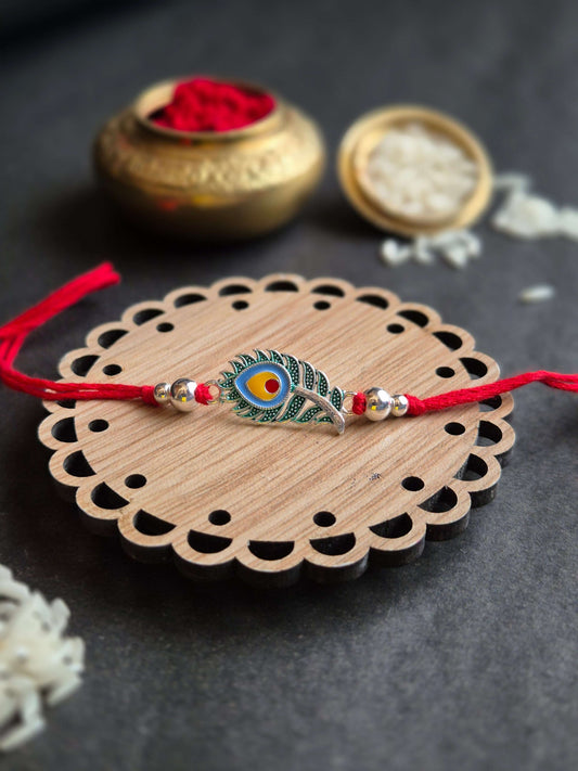 Elegant Peacock Feather Sterling Silver Rakhi (Blessed & Vibrant)