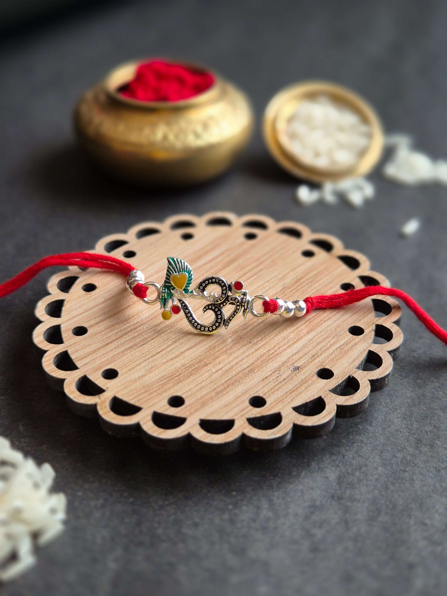Artistic Om Feather Sterling Silver Rakhi (Blessed & Vibrant)