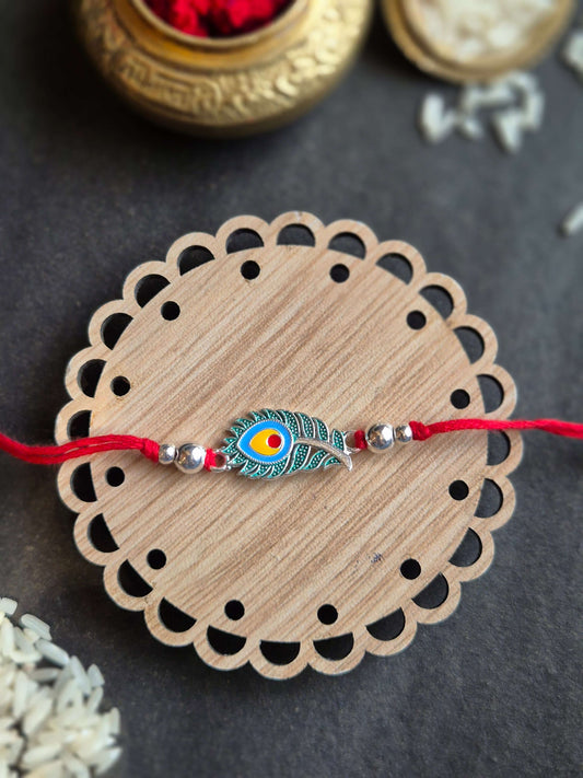 Elegant Peacock Feather Sterling Silver Rakhi (Blessed & Vibrant)